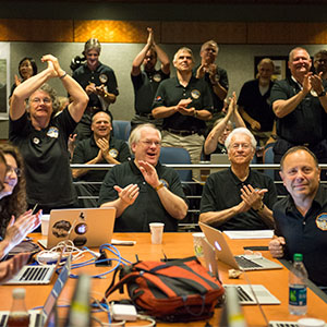 Part of the New Horizons team celebrating the spacecraft's flyby of Pluto.